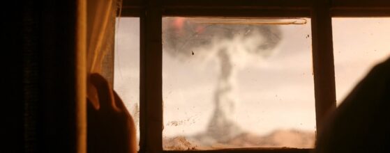 Girl watching nuclear explosion in the dessert from her window filmed on a Virtual Production stage